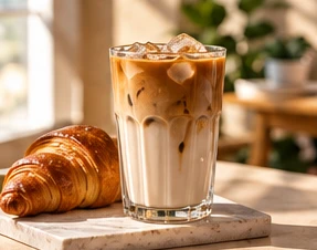 Iced latte with a croissant